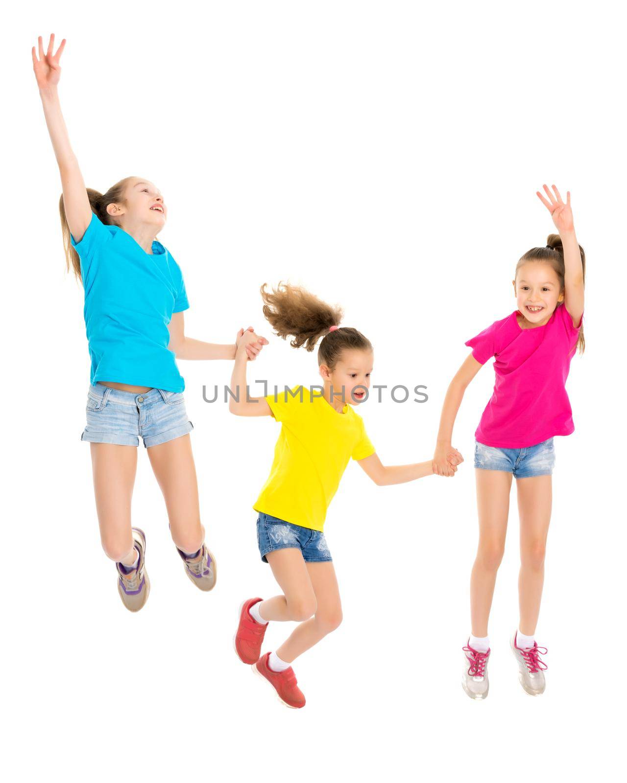 A large group of happy joyful children jumps and dances. The concept of sport, summer holidays. Isolated on white background.