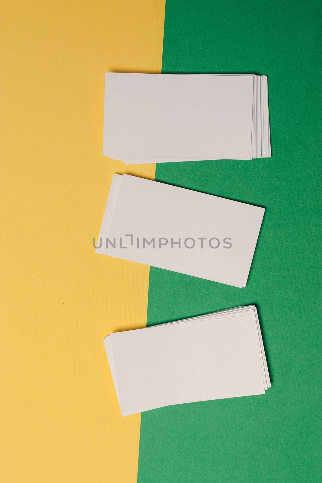 white business cards documents colorful background office copy-space. High quality photo