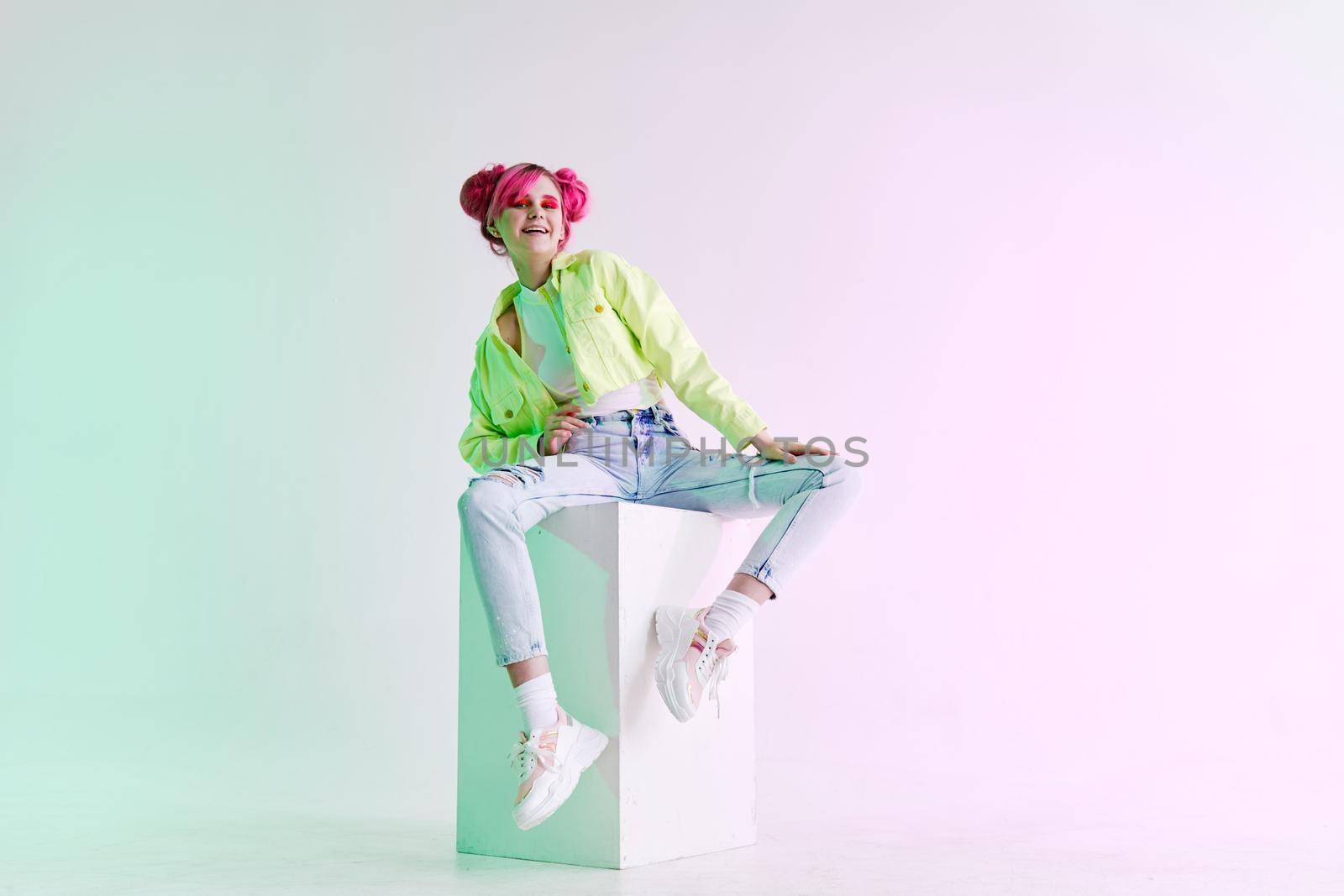 fashionable woman with pink hair creative studio model. High quality photo
