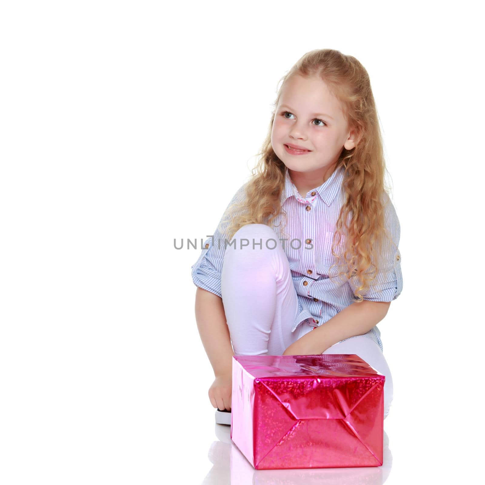 Little girl with a gift by kolesnikov_studio