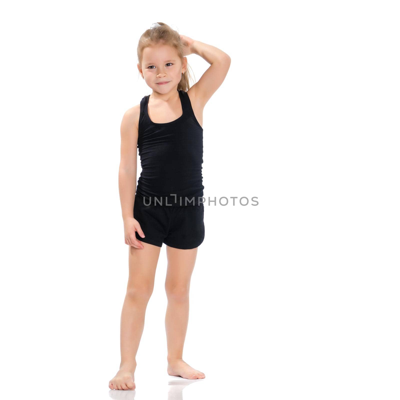 Beautiful little girl in full growth. The concept of a happy childhood, healthy lifestyle. Isolated on white background.