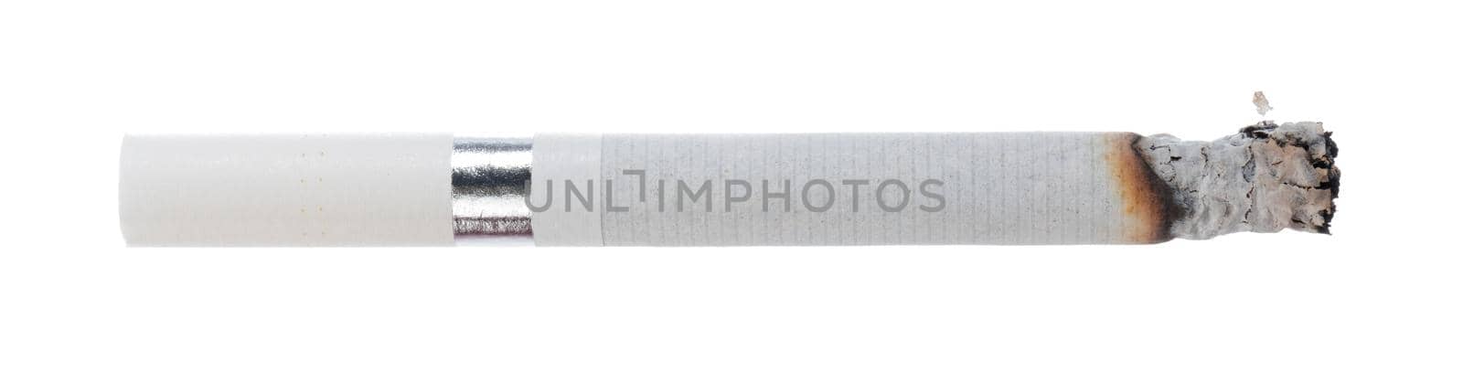 Lit cigarette isolated on white background close up top view