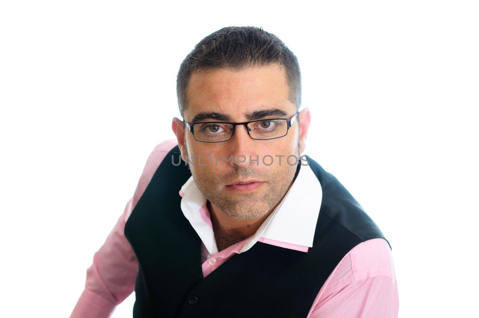 A successful businessman with glasses wearing vest and pink shirt