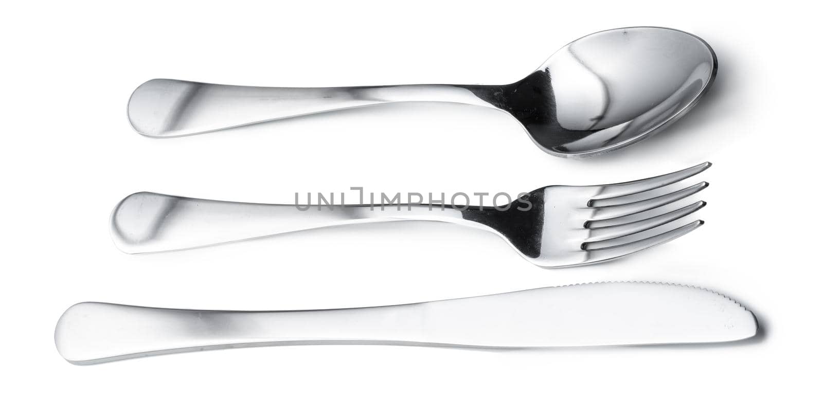Spoon, knife and fork isolated on white background. Close up.