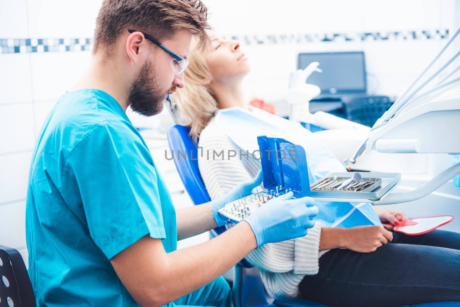 Dentist taking dentistry equipent for patient