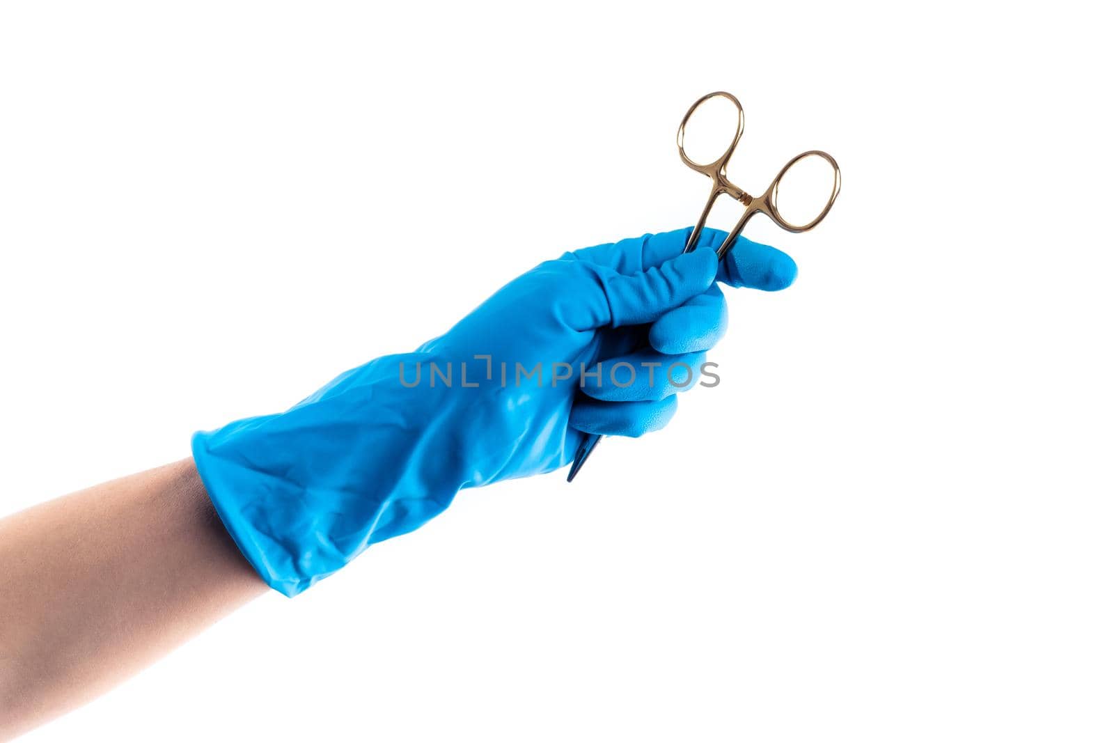 Hand in blue glove holding dental metal tool isolated on white background