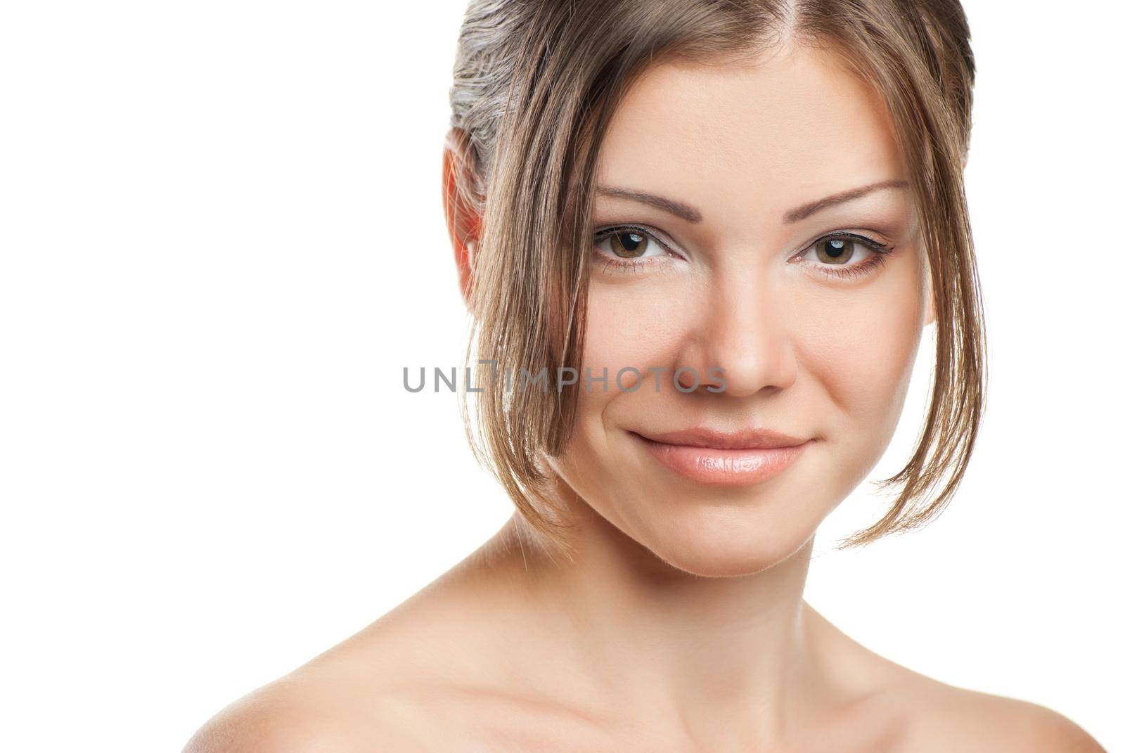 Beautiful woman's face with clean skin on white by Julenochek