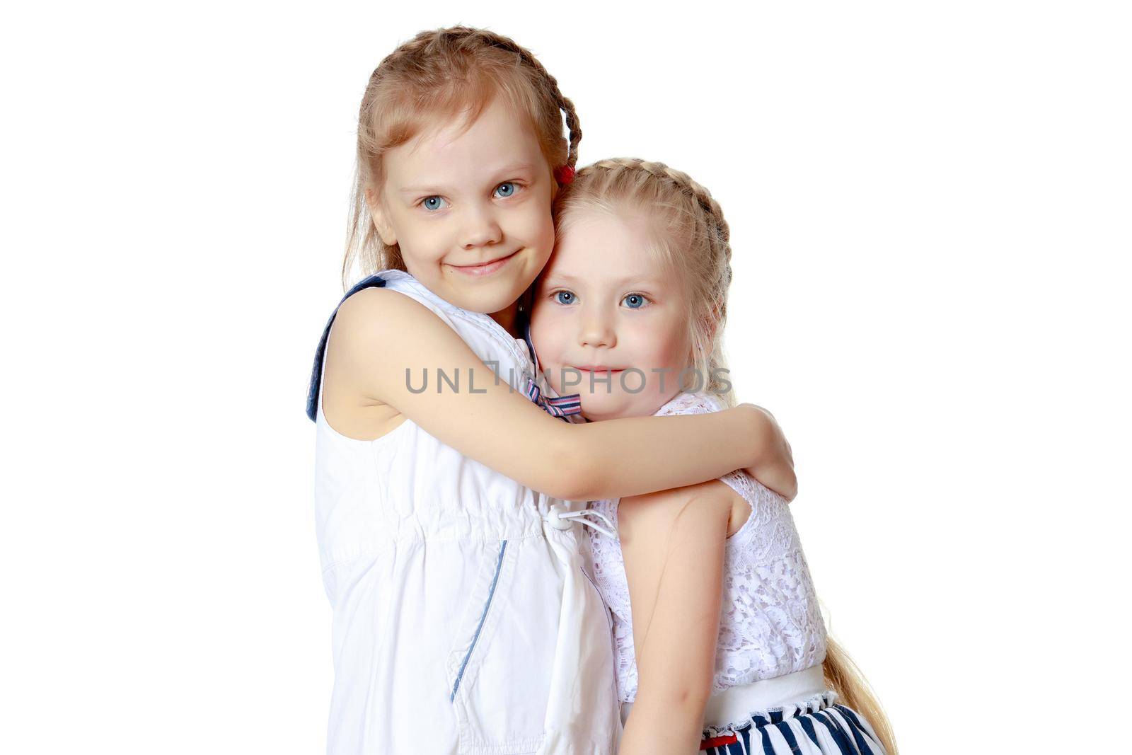 Two cute little girls close-up by kolesnikov_studio