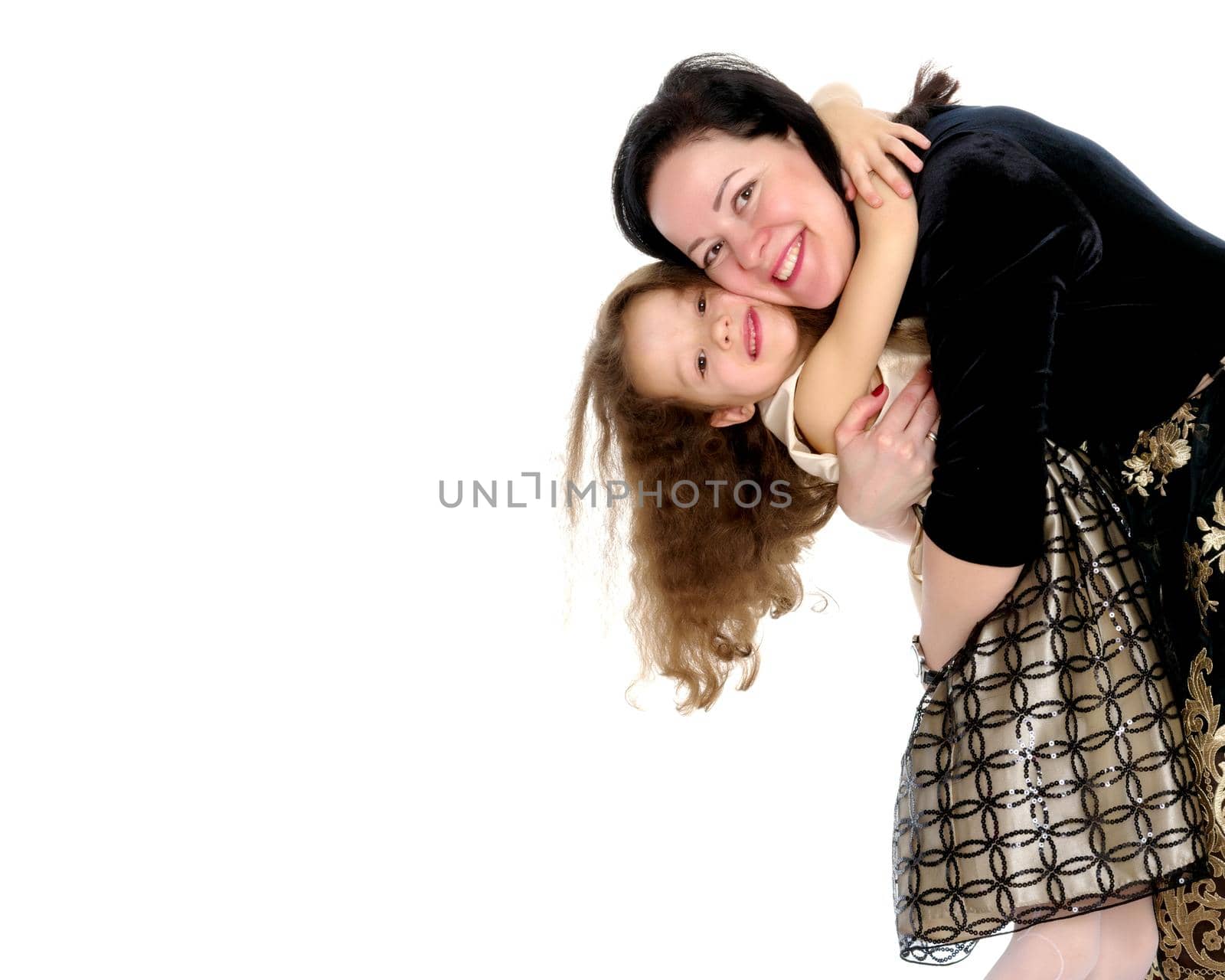 mother and little daughter gently embrace by kolesnikov_studio