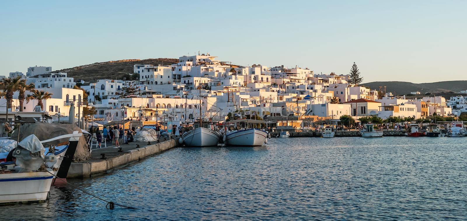 old port in the village on the island of Paros at sunset. Greece