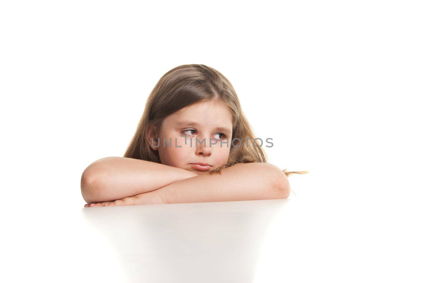 Portrait of a beautiful crying girl over white background