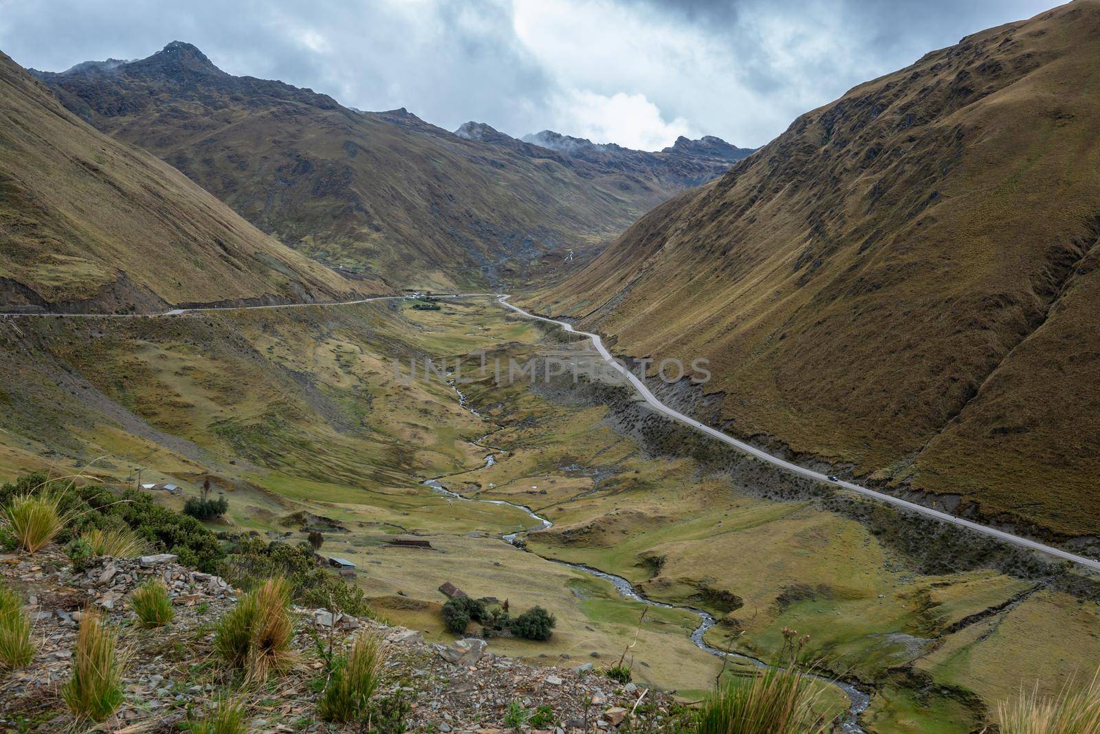 Beatiful dry mountain in forested countryside in sunny Bolivia on panorama with blue sky and big clouds