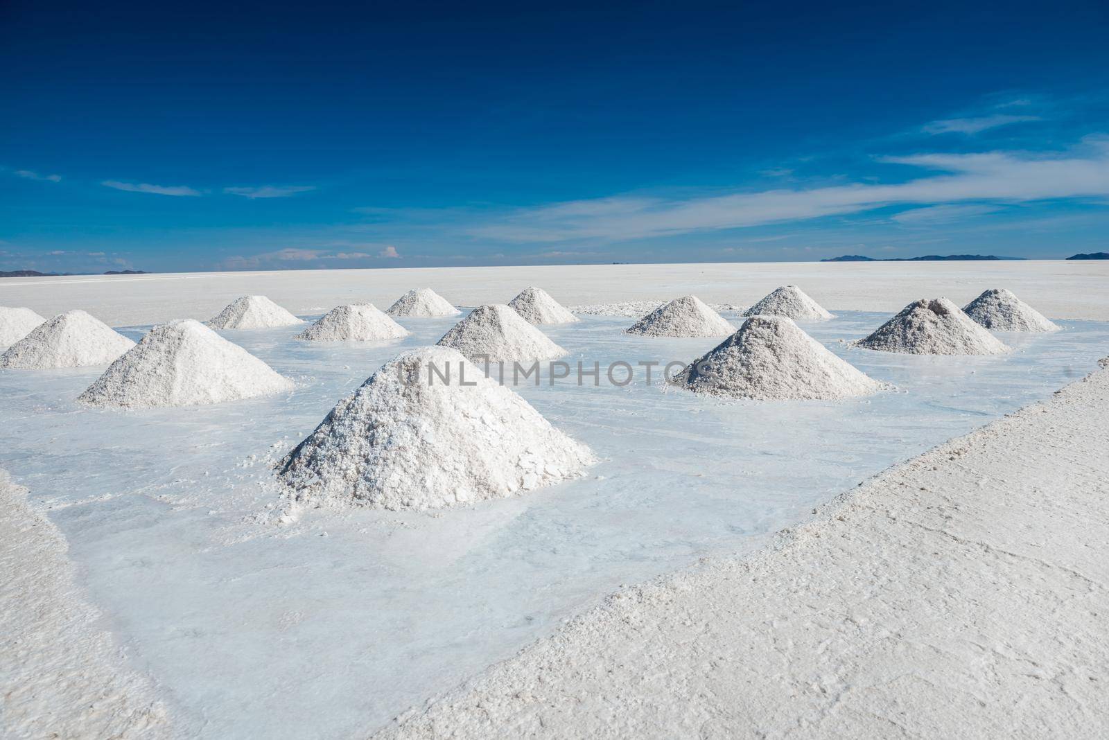 Sunshine scenery of area with salt banks in Salar de Uyuni in Bolivia
