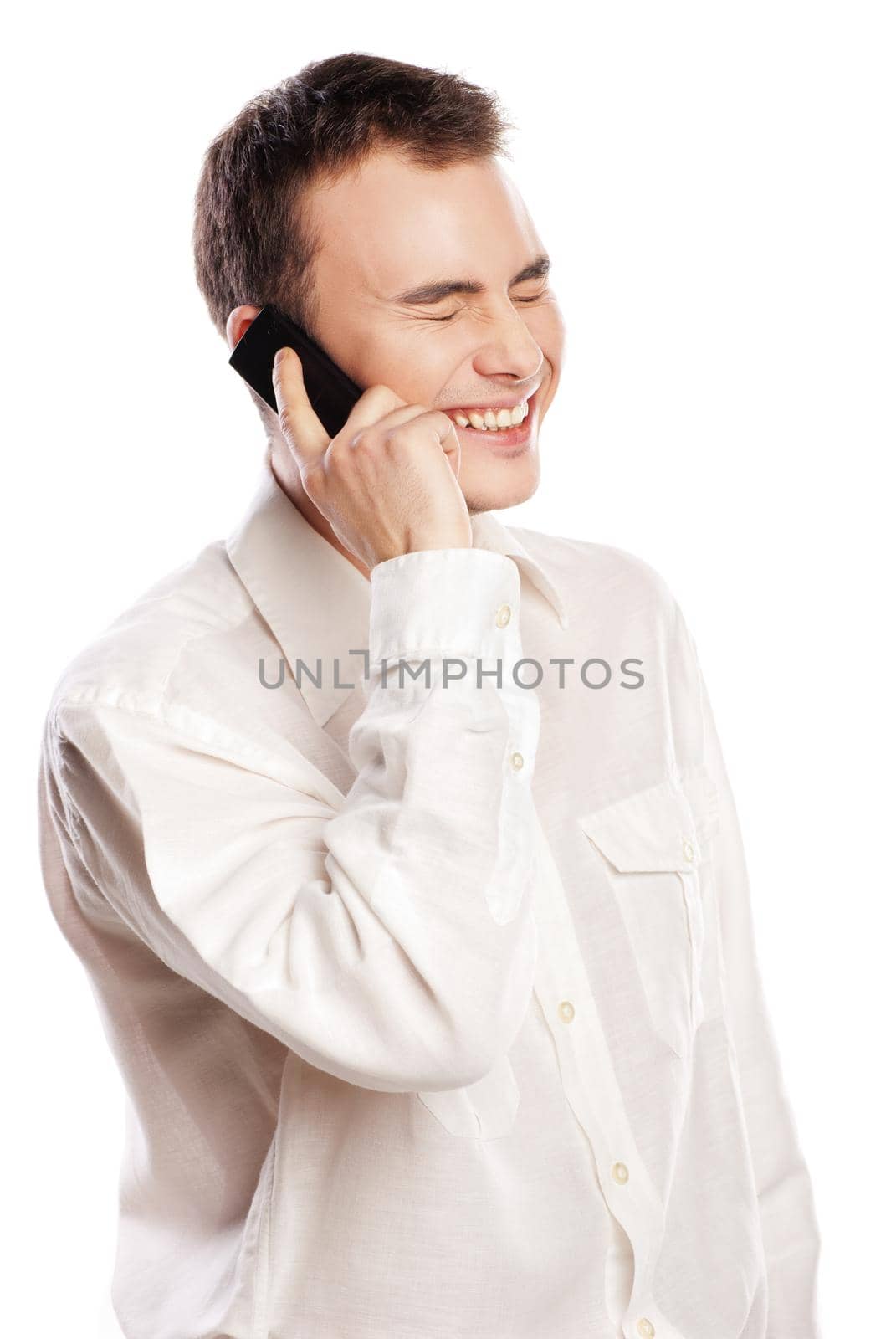 Man smiling and talking on phone isolated by Julenochek