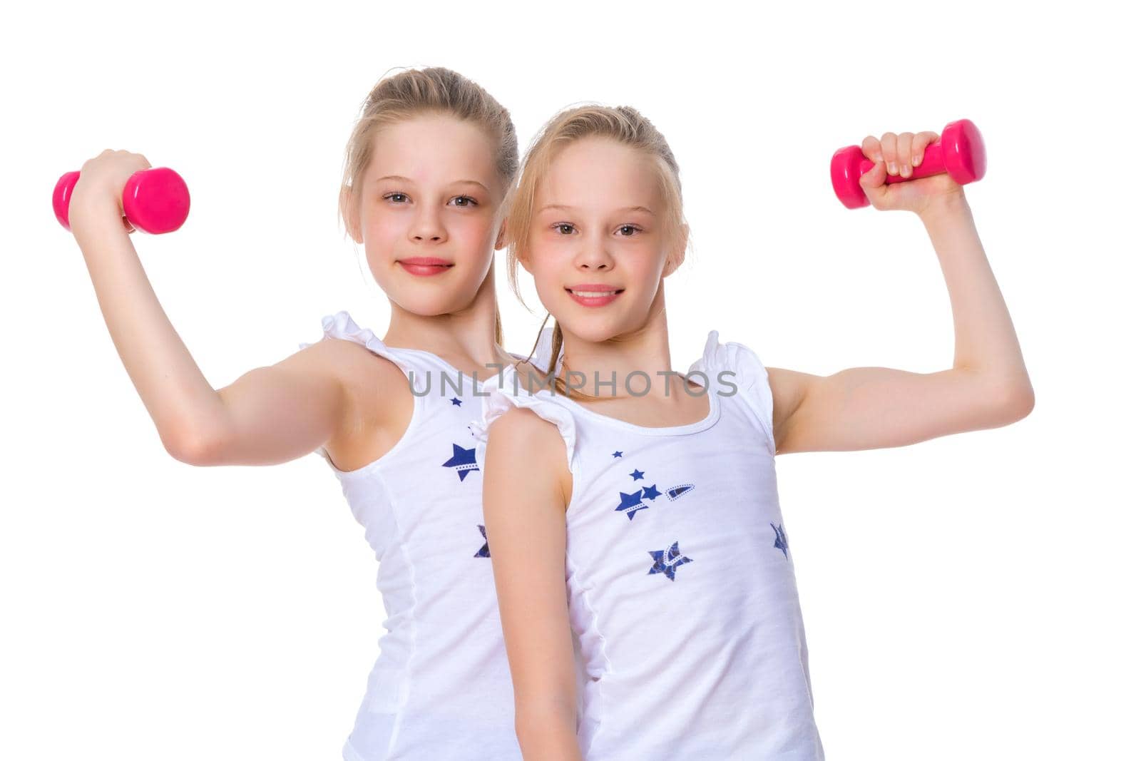 Girls gymnasts show their muscles. by kolesnikov_studio