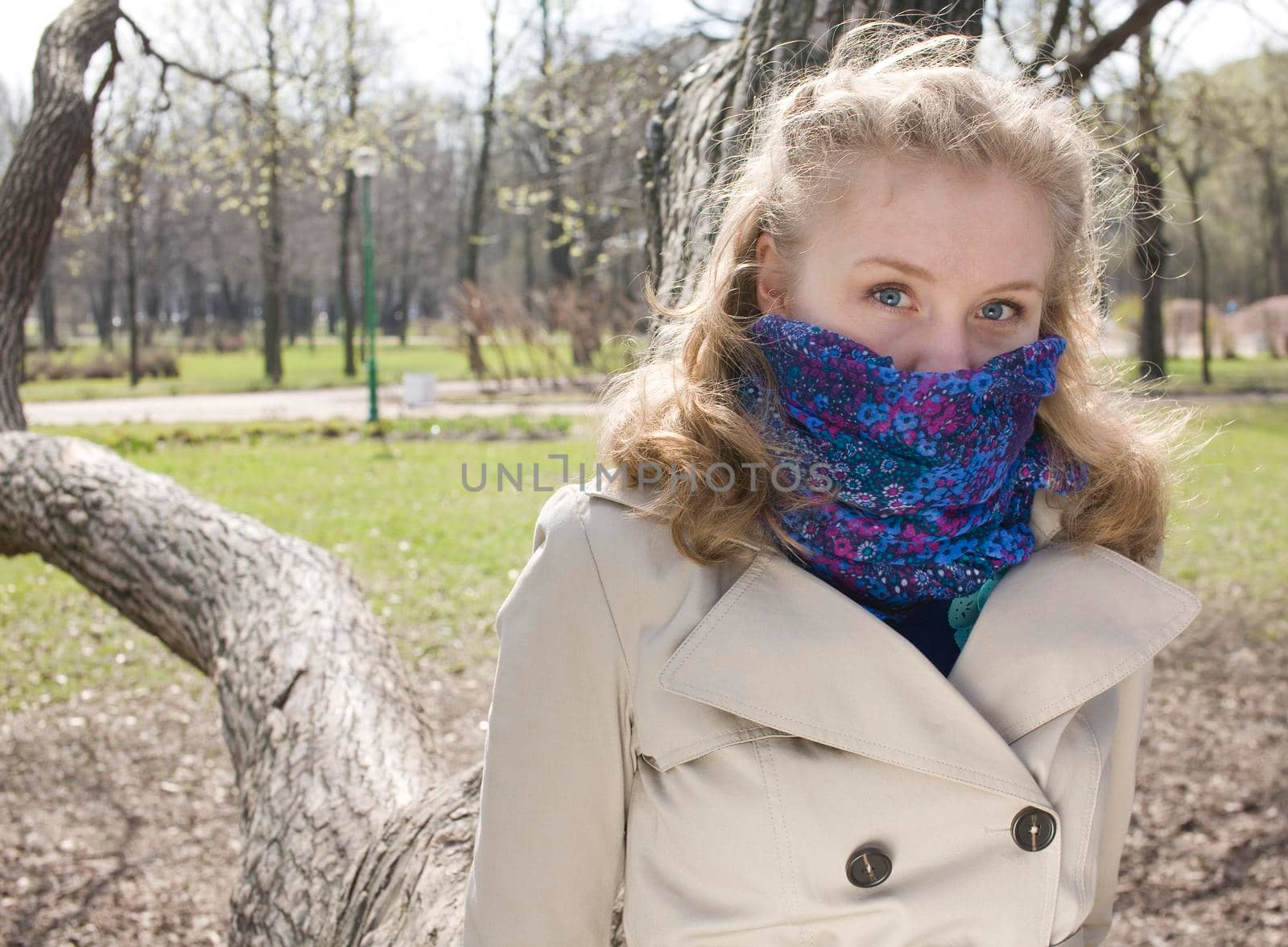 young pretty blonde girl enjoing spring nature in park, lifestyle people concept close up
