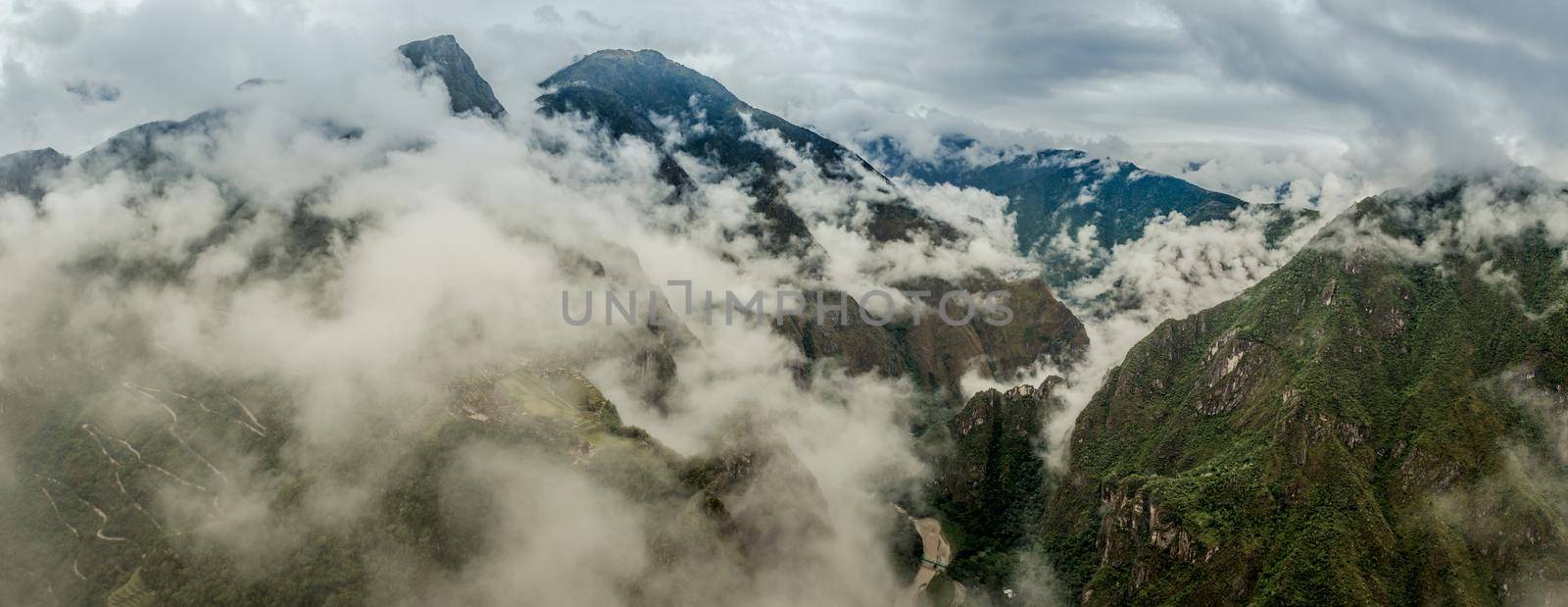 Aerial view of Machupicchu with clouds by tan4ikk1