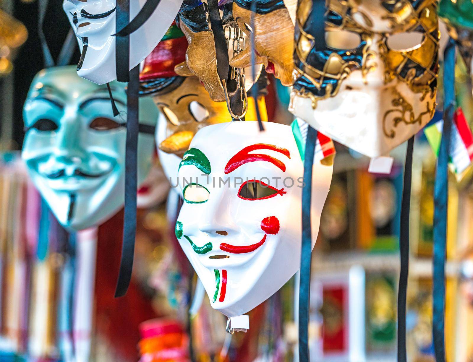 Venetian masks in store display in Venice. Annual carnival in Venice is among the most famous in Europe. Its symbol is the Venetian mask