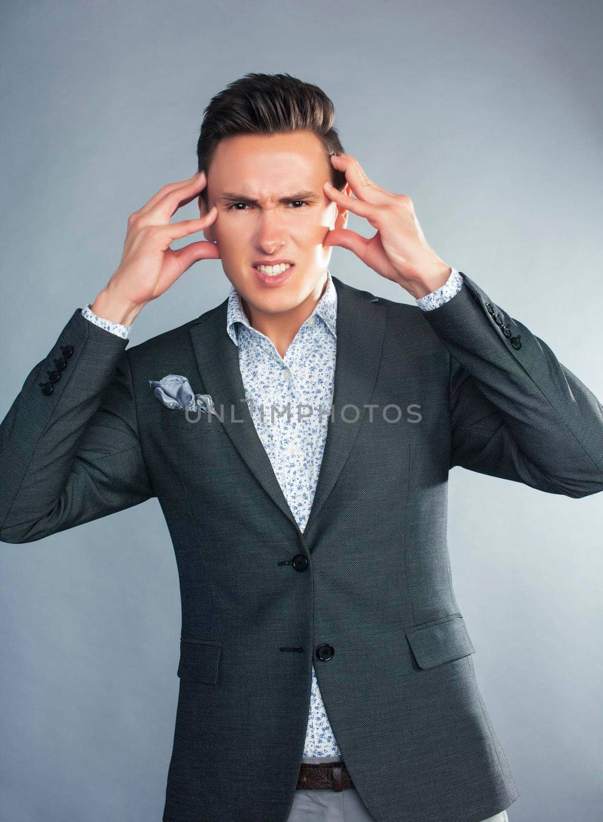 young pretty businessman posing emotional gesturing on white background, lifestyle people concept by JordanJ