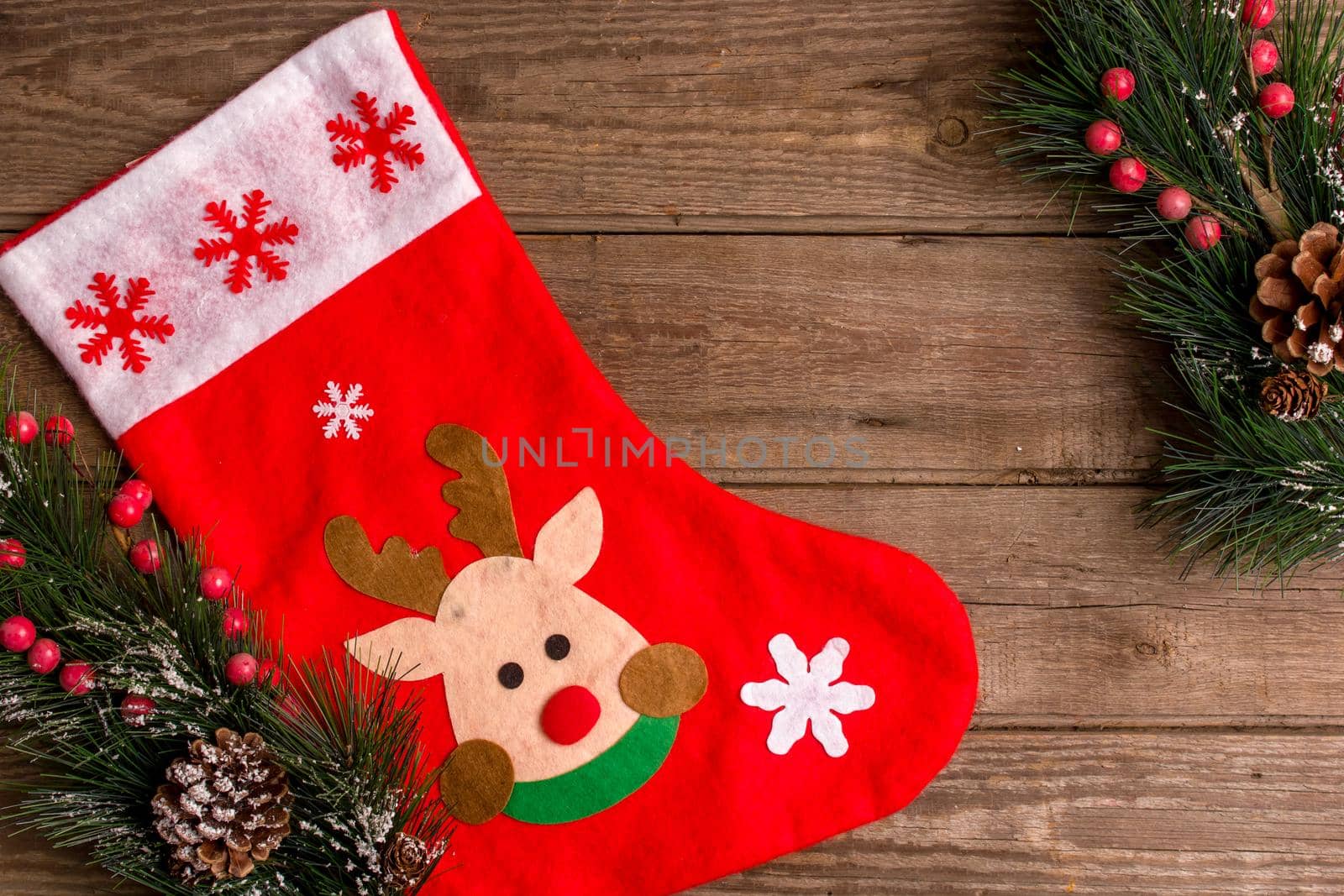 New Year and Christmas mokcup. Xmas lights on wooden background, space for your text, copyspace. from above. Holiday winter planning concept. Flat lay style.