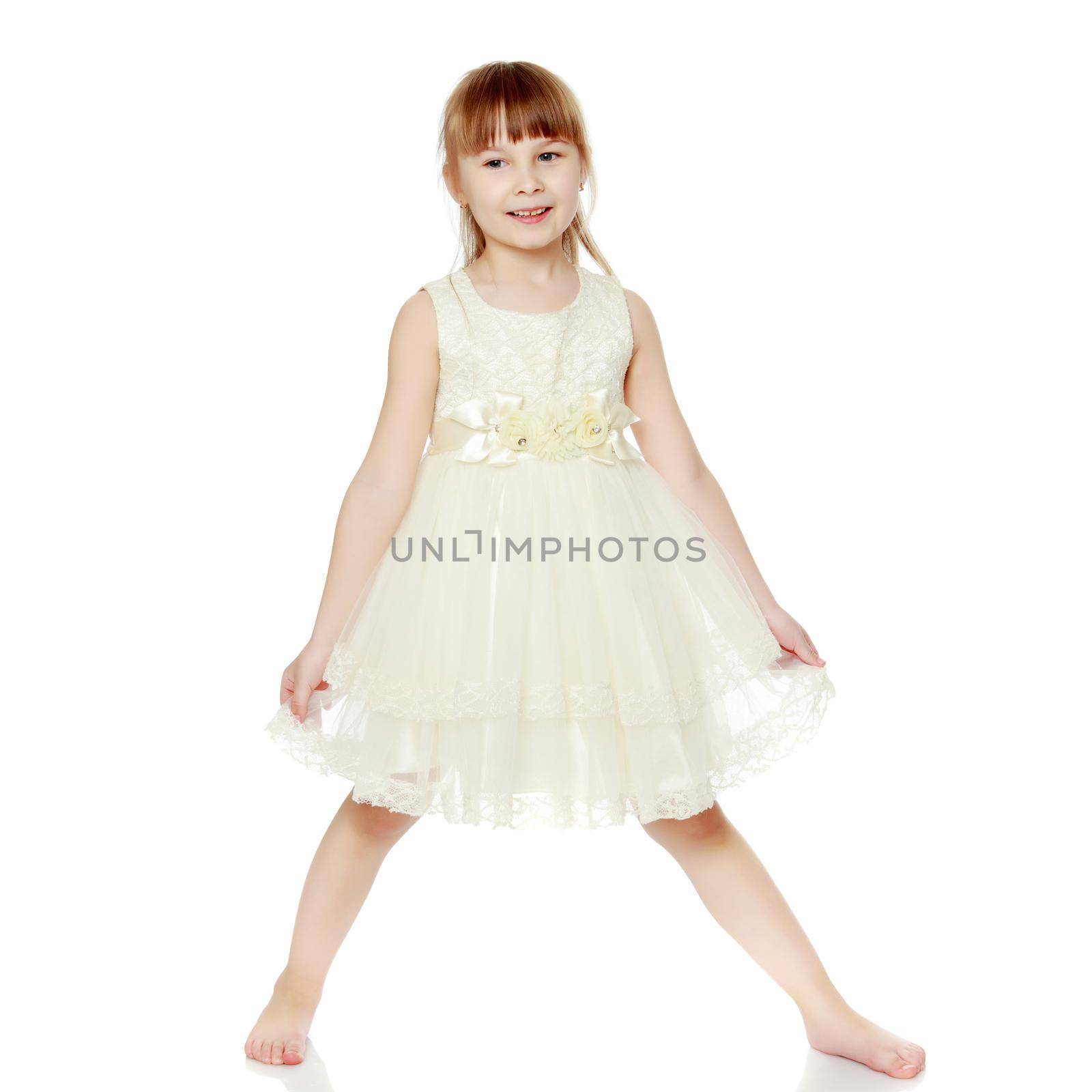 Fashionable little girl in a dress by kolesnikov_studio