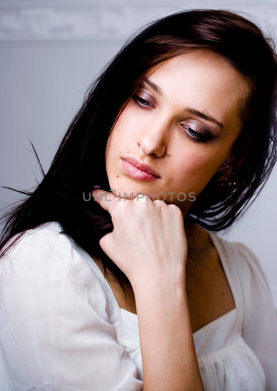 young pretty brunette woman smiling happy on white background smooth blurred, lifestyle people concept close up