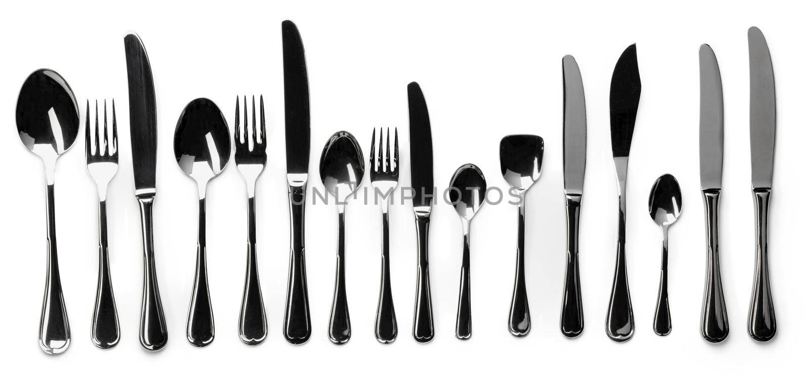 Set of stainless steel cutlery isolated on white by Fabrikasimf