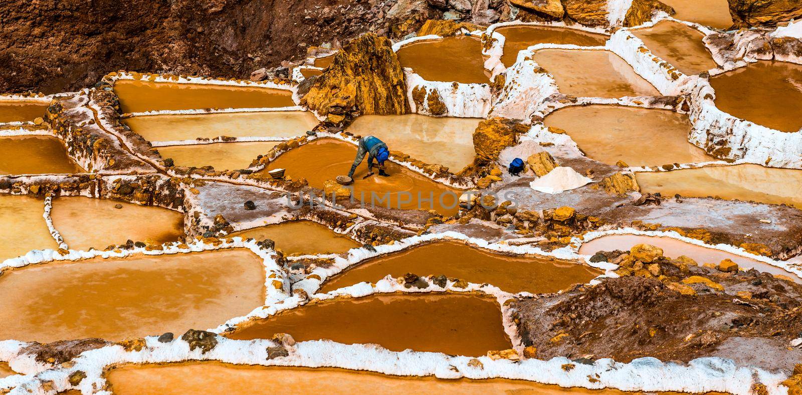 salt extraction in Peru. Workers at Salinas de Maras