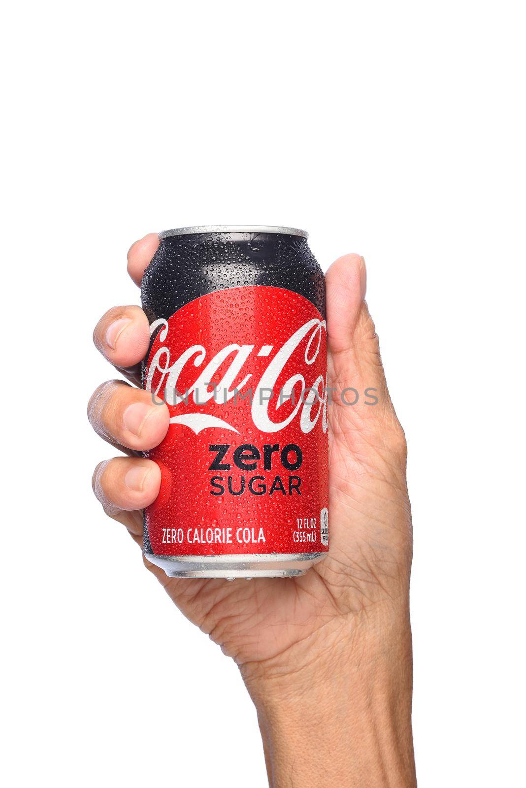 IRVINE, CALIFORNIA - APRIL 26, 2019: Closeup of a hand holding a cold can of  Coca-Cola Zero.