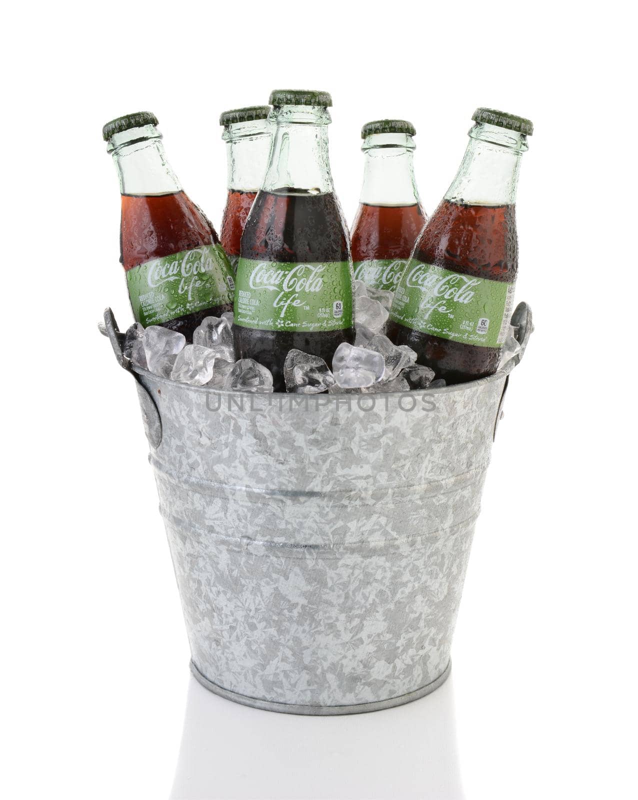 IRVINE, CA - FEBRUARY 15, 2015: Coca-Cola Life bottles in an ice bucket. A reduced calorie soft drink sweetened with cane sugar and Stevia, containing 60% of the calories of Classic Coke.