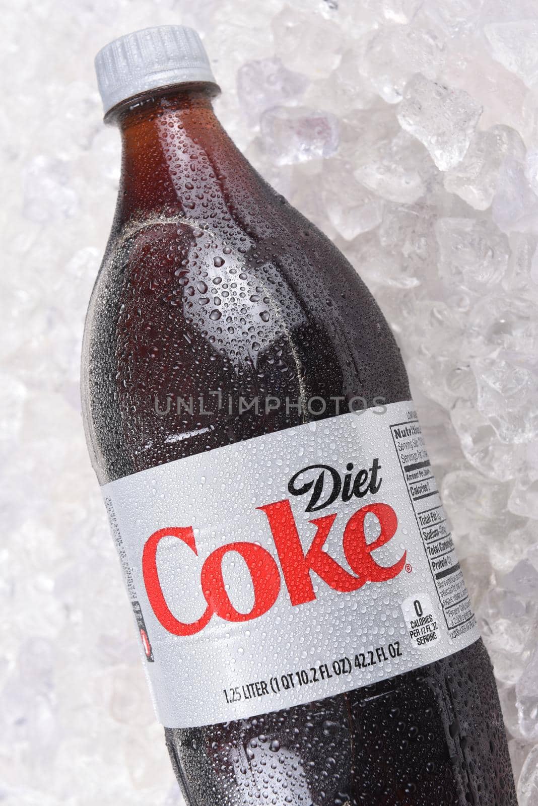 IRVINE, CALIFORNIA - DECEMBER 15, 2017: A bottle of Diet Coke on ice. Coca-Cola is the one of the worlds favorite carbonated beverages.