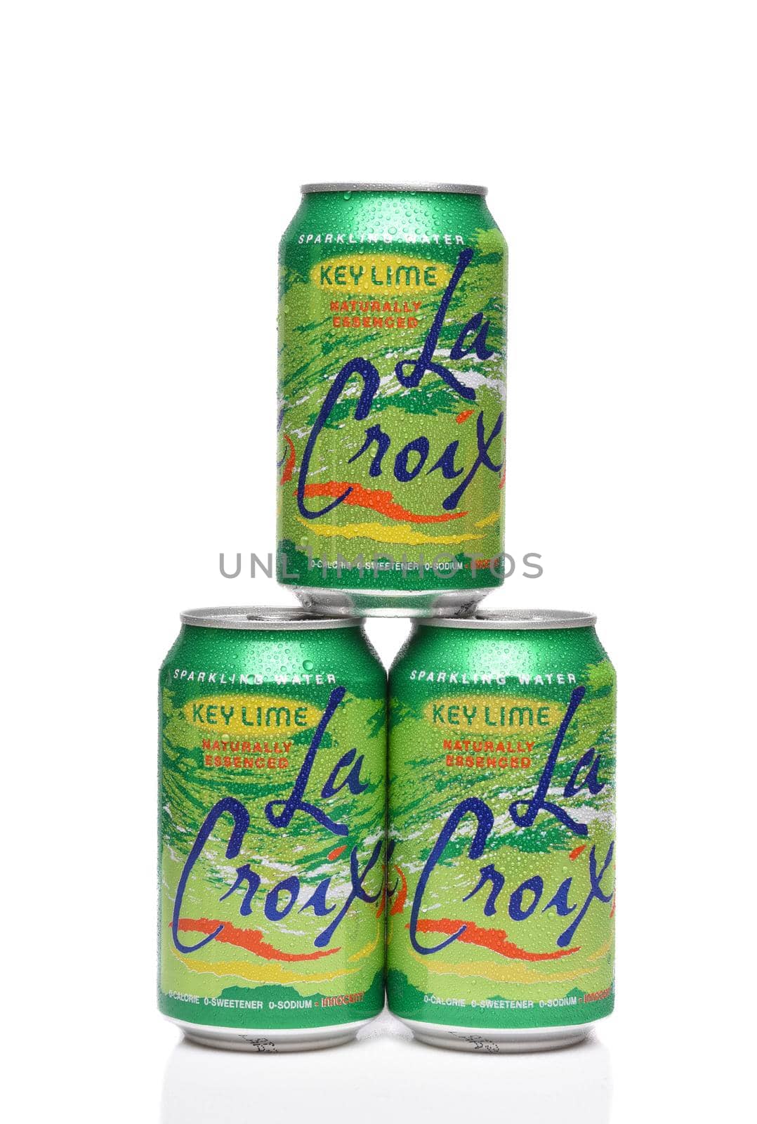 IRVINE, CALIFORNIA - 20 DEC 2019:Three cans of La Croix Key Lime Sparkling Water with condensation isolated on white with reflection. by sCukrov