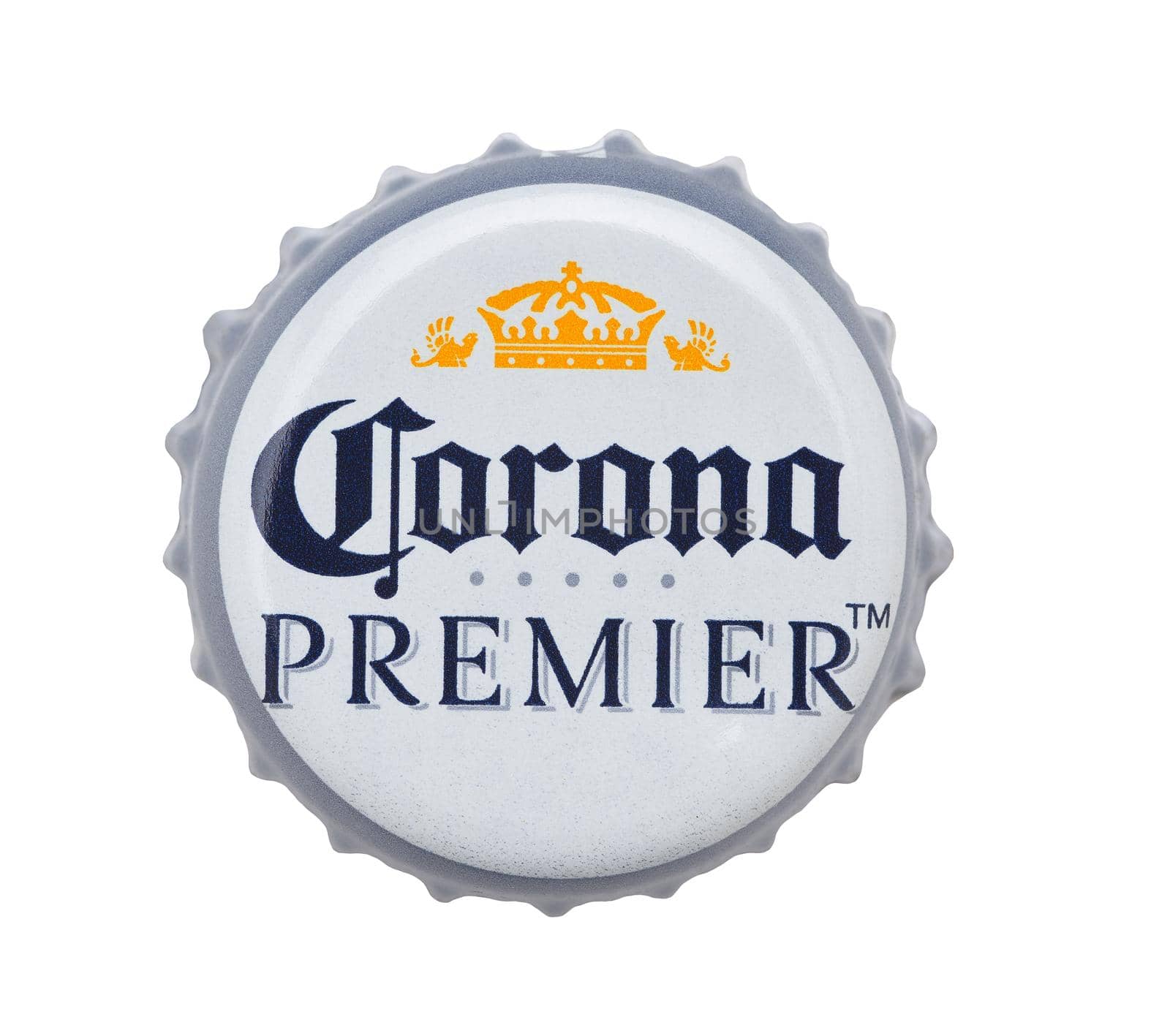 IRVINE, CALIFORNIA - 4 JUNE 2020: Closeup of a Corona Premier beer bottle cap on white.