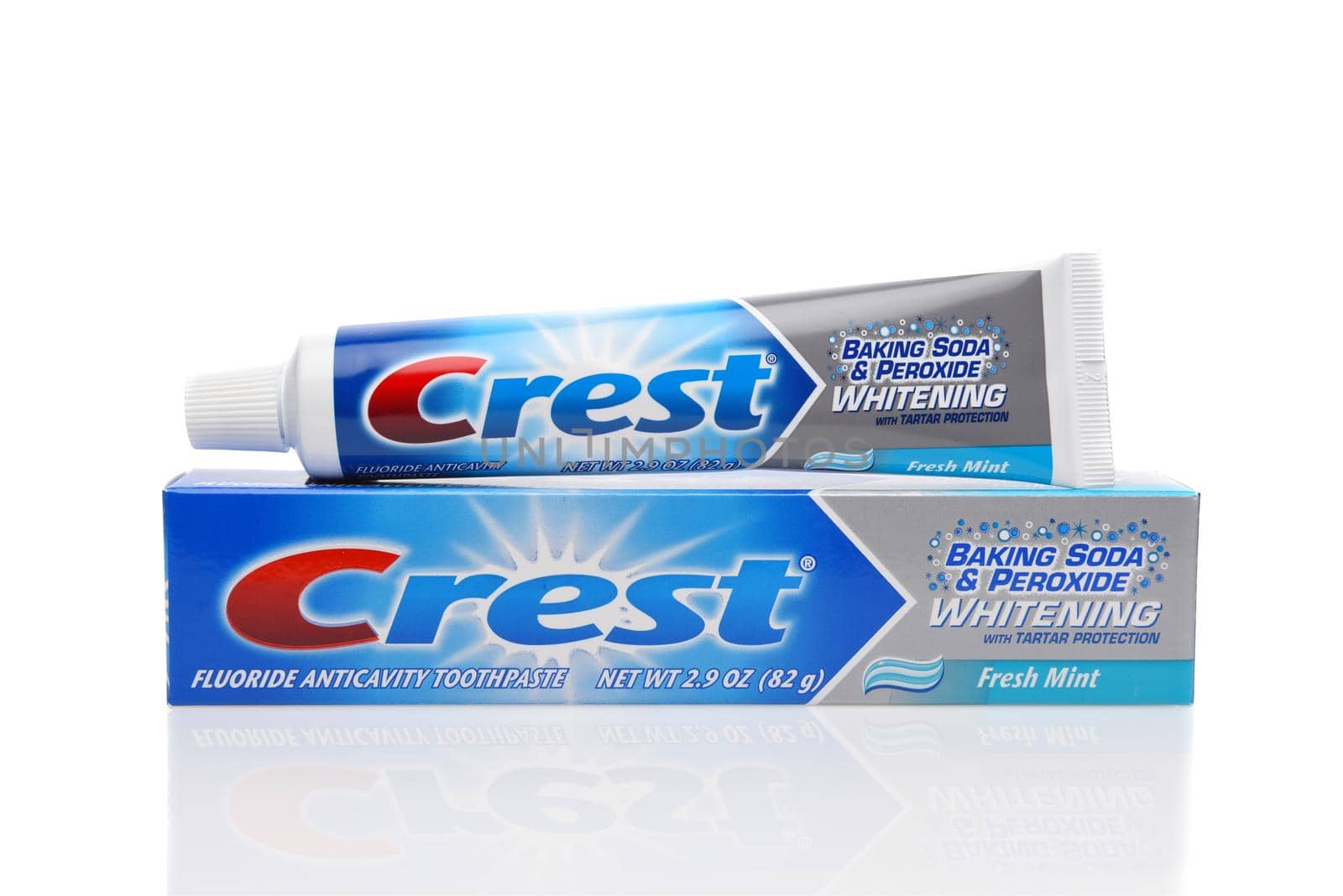 IRVINE, CALIFORNIA - AUGUST 20, 2019: A tube of Crest Fluoride Anticavity Whitening Toothpaste with Baking Soda and Peroxide, Fresh Mint flavor. by sCukrov