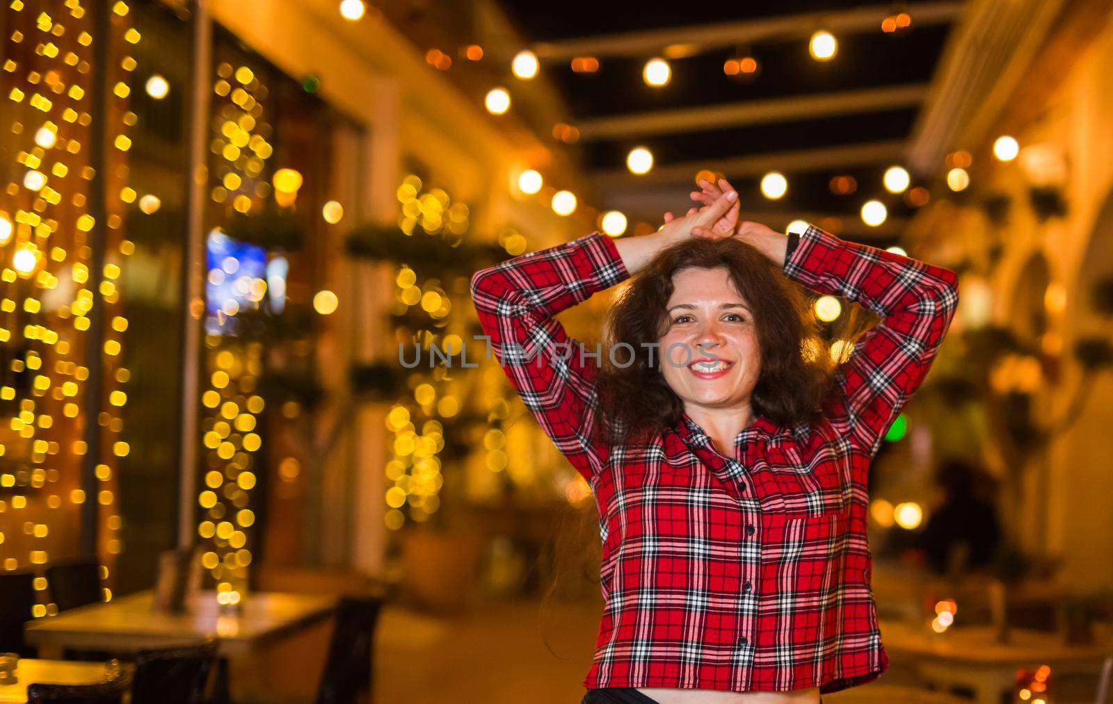 Young mother received a surprise from her daughter feeling excited open the mouth and looking at the gift in amazement in mother's day. Holidays, birthday and presents concept. by Satura86