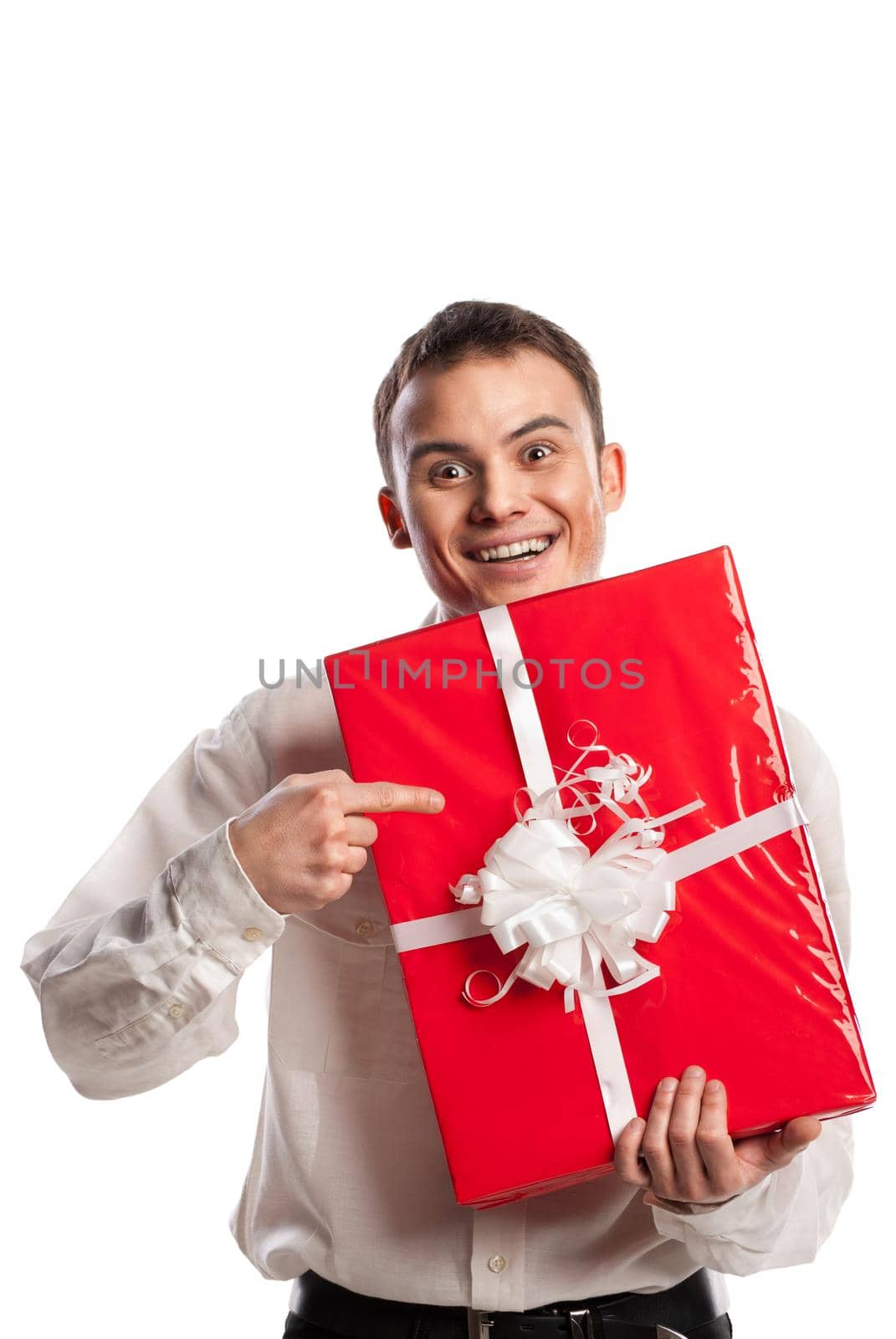 smiling man holding gift isolated on white by Julenochek