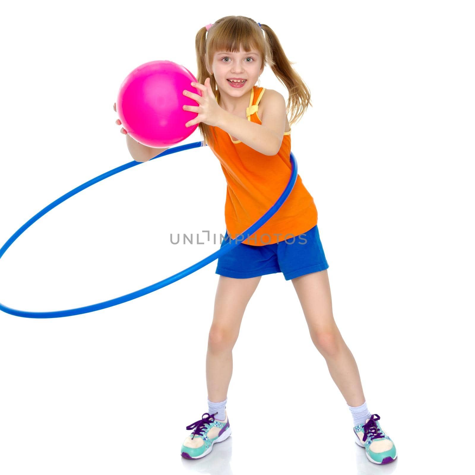 A girl gymnast performs an exercise with a hoop. The concept of gymnastics and fitness. Isolated on white background.