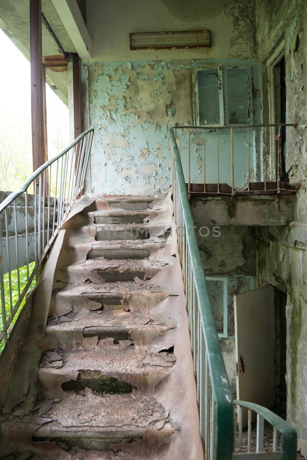 dirty stairs in abandoned building in Pripyat, Chernobyl
