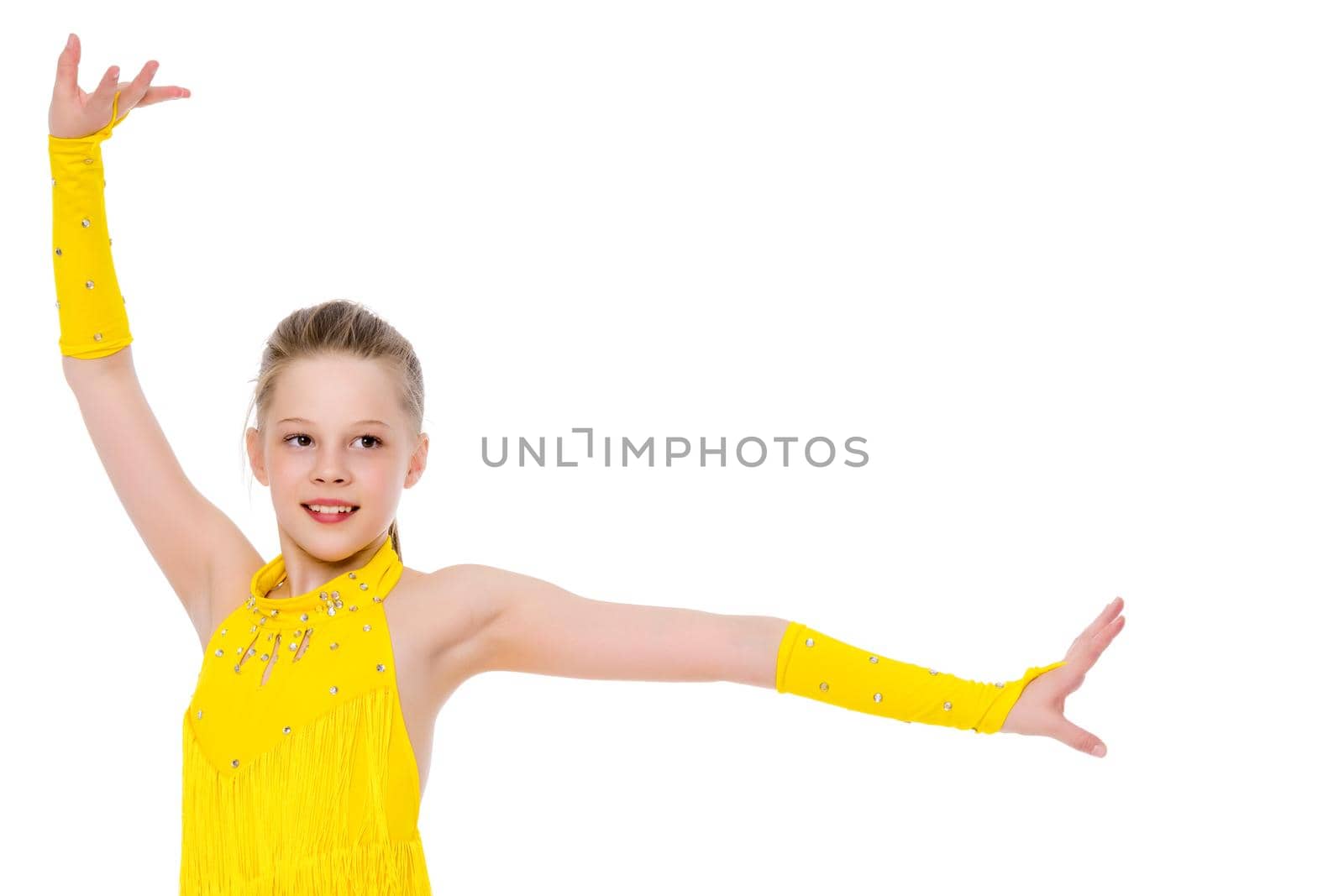 Little girl gymnast in a beautiful sports swimsuit for competitions, close-up. The concept of sport and fitness, a happy childhood. Isolated on white background.