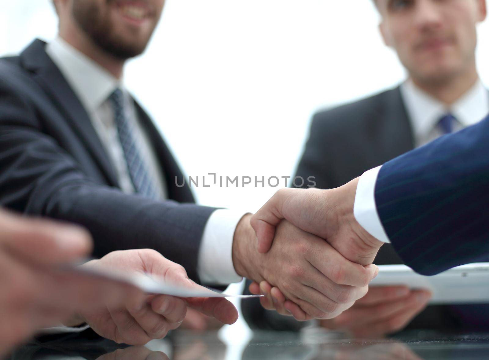 close up. handshake business colleagues by asdf