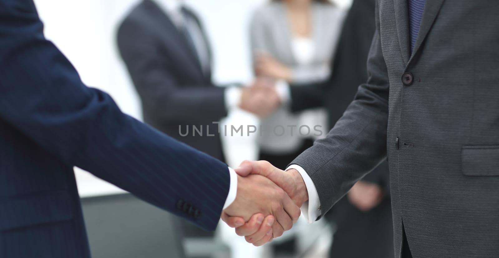 concept of cooperation.handshake of business partners.