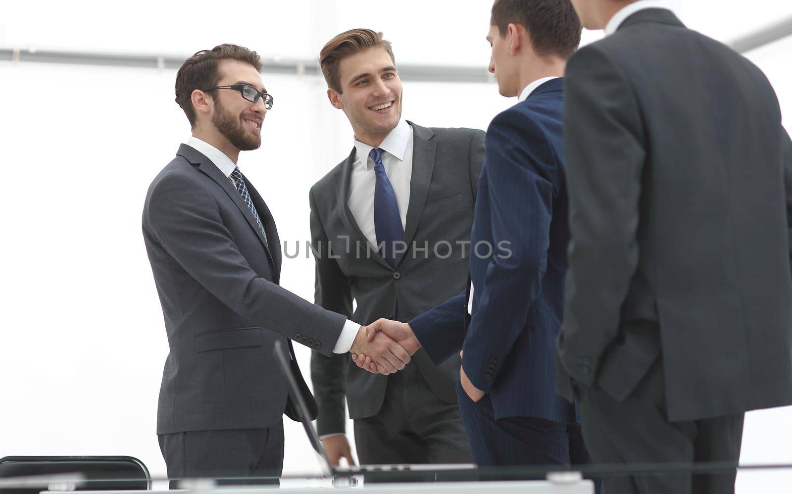 welcome handshake of business partners.