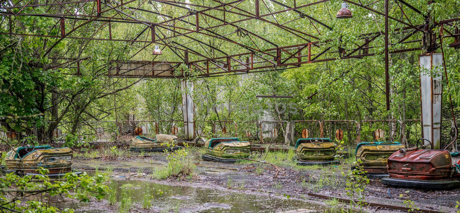 playground with cars in Pripyat park by tan4ikk1