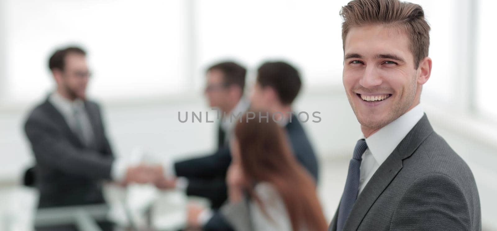 portrait of businessman on blurred background.