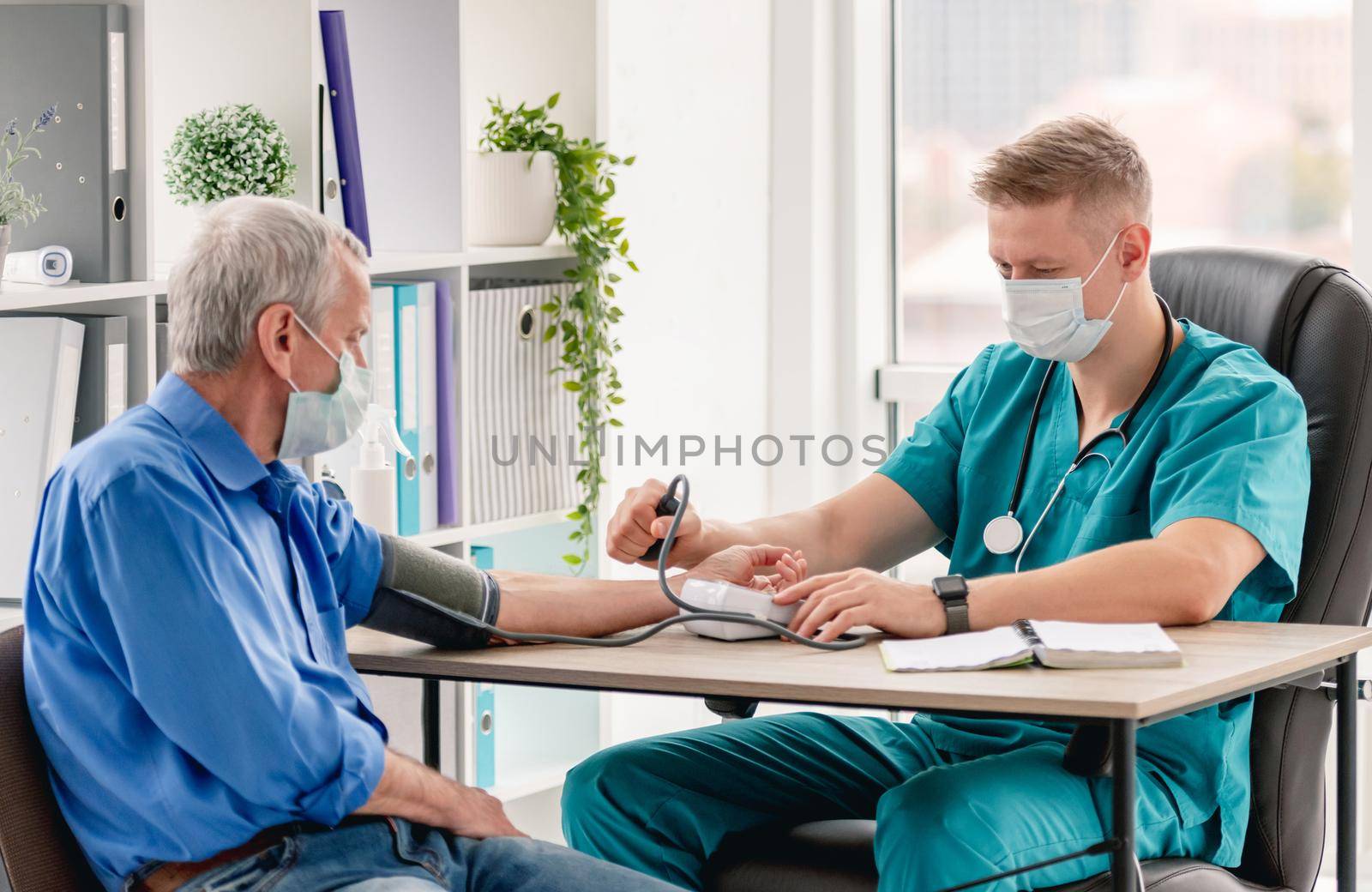 Mature man at physician appointment by tan4ikk1