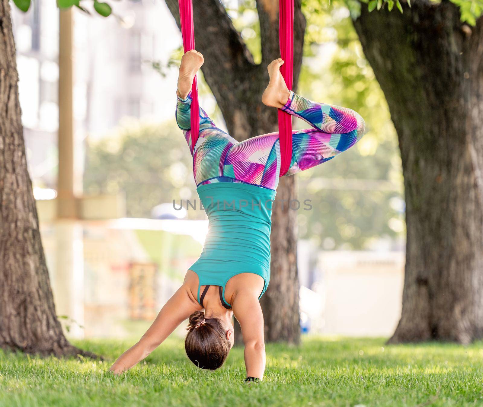 Girl doing fly yoga by tan4ikk1