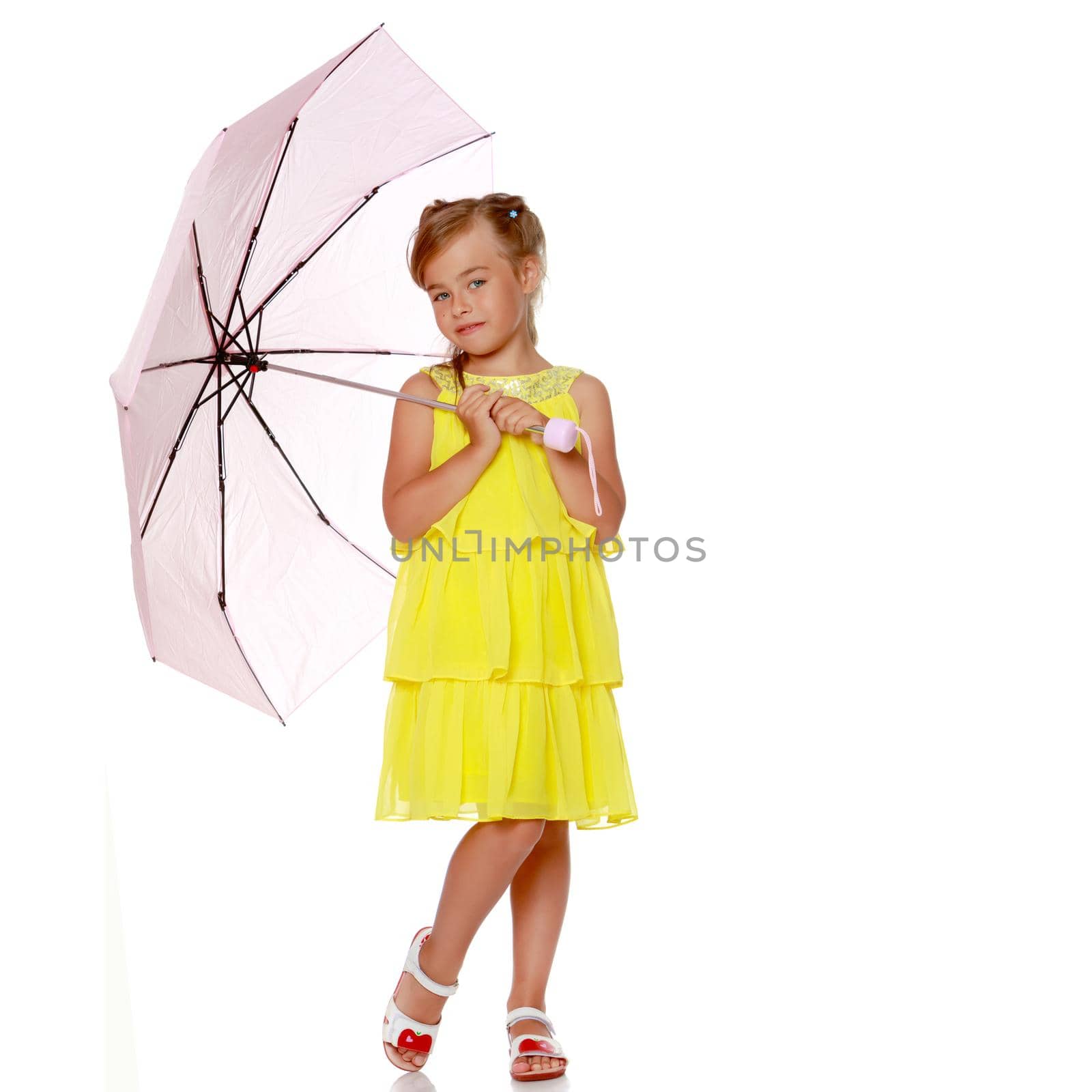 The little girl is full-length. The concept of family happiness, a child, childhood, play, beauty and fashion. isolated on white background