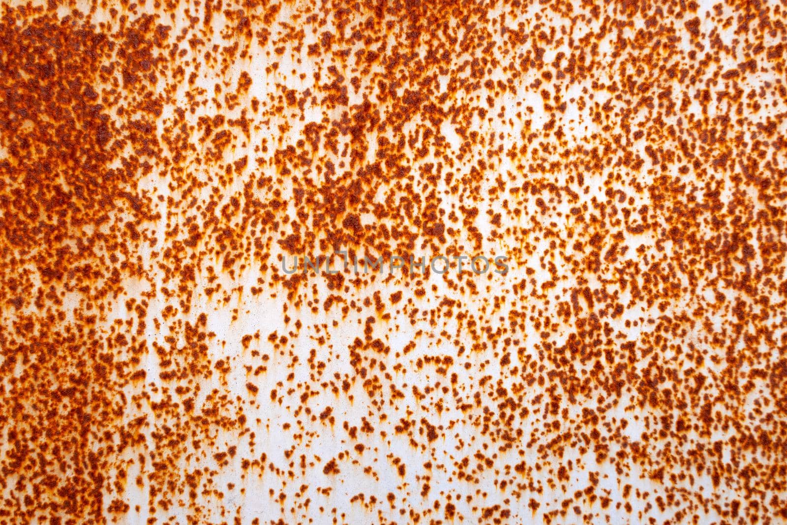 Rusty iron and the remnants of gray paint.Horizontal background.