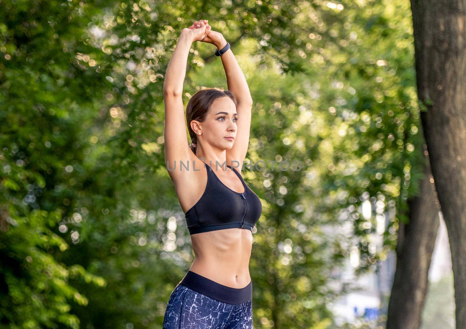 Girl doing yoga at nature by tan4ikk1