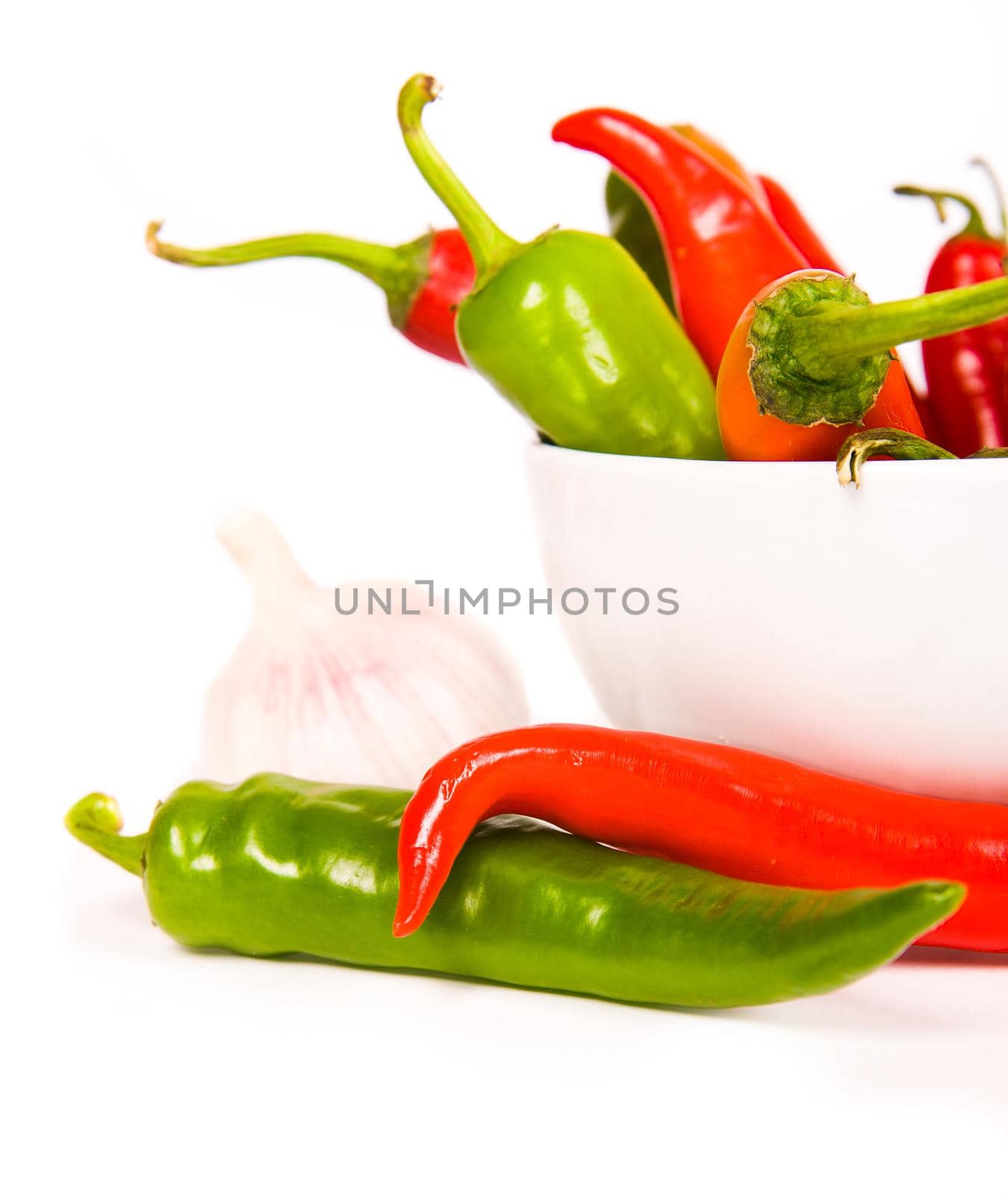 Red chili peppers over a white background